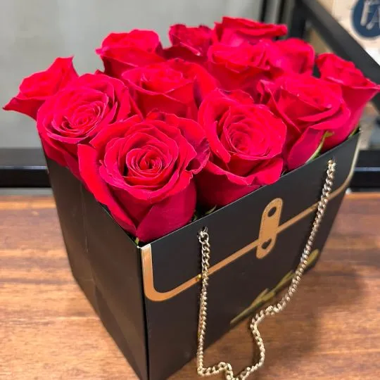 Arreglo de rosas importadas cartera